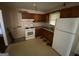 Well-lit kitchen showcasing a vintage-style layout, gas range, and ample counter space at 439 Oakside Sw Dr, Atlanta, GA 30331