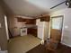 Functional kitchen features a white refrigerator and gas range oven at 439 Oakside Sw Dr, Atlanta, GA 30331
