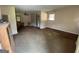 Spacious living room with carpet flooring, ceiling fan, and natural light at 439 Oakside Sw Dr, Atlanta, GA 30331