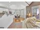 Bright breakfast nook with hardwood floors, chandelier, and plenty of natural light at 123 Fielding Rdg, Peachtree City, GA 30269