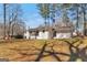 Spacious white brick home with beautiful backyard and wooded views at 2598 Lake Shore, College Park, GA 30337