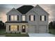 Charming two-story brick home with a two-car garage and welcoming front porch at 1653 Sungrown Way, Mcdonough, GA 30253