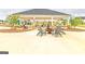 Community fire pit area featuring Adirondack chairs and stone pillars beneath a shaded pavilion at 1653 Sungrown Way, Mcdonough, GA 30253