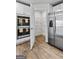 Kitchen features stainless steel appliances, double ovens, and a convenient walk-in pantry at 1653 Sungrown Way, Mcdonough, GA 30253