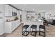 Modern kitchen featuring stainless steel appliances, granite countertops, and a breakfast bar at 1653 Sungrown Way, Mcdonough, GA 30253