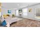 Cozy living room filled with natural light featuring stylish furniture and decor at 1653 Sungrown Way, Mcdonough, GA 30253