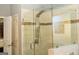 Modern glass-enclosed shower with decorative tile accents and dual shower heads, a spa-like retreat at 7625 Bowhead Ct, Fairburn, GA 30213