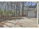 Backyard with trees, grass and outdoor shed, next to the house patio, and plenty of outdoor area at 114 Oak Ridge Dr, Sharpsburg, GA 30277