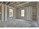 Unfinished basement offering potential with bright light, framed walls, and light at 114 Oak Ridge Dr, Sharpsburg, GA 30277