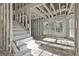 Unfinished basement with a staircase, exposed beams, and bright natural light from large windows at 114 Oak Ridge Dr, Sharpsburg, GA 30277
