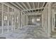 Unfinished basement featuring exposed beams and light, ready for customization at 114 Oak Ridge Dr, Sharpsburg, GA 30277