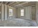 Unfinished basement with natural light is ready for customization and future expansion, offering a blank canvas for your vision at 114 Oak Ridge Dr, Sharpsburg, GA 30277