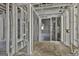 Unfinished basement features water tank, exposed framing, utilities, and light at 114 Oak Ridge Dr, Sharpsburg, GA 30277