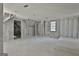 An upper room features a sloped ceiling and bright window at 114 Oak Ridge Dr, Sharpsburg, GA 30277