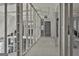 The hallway has exposed framing with bright windows and a view of the bathroom at 114 Oak Ridge Dr, Sharpsburg, GA 30277