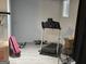 Treadmill in the unfinished basement space at 3223 Thornecreek Dr, Douglasville, GA 30135