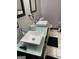 Bathroom featuring dual vessel sinks, vanity, and stylish tile flooring at 3223 Thornecreek Dr, Douglasville, GA 30135