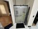 Bathroom boasts glass enclosed shower, with tiled surround at 3223 Thornecreek Dr, Douglasville, GA 30135