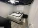 Bedroom with a ceiling fan, light grey walls, wood-look floors, and a white bed with black and white accents at 3223 Thornecreek Dr, Douglasville, GA 30135