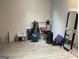 Exercise room with a mirror, wood-look flooring, and workout equipment at 3223 Thornecreek Dr, Douglasville, GA 30135