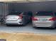 Garage featuring cars and painted flooring at 3223 Thornecreek Dr, Douglasville, GA 30135