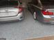 Spacious two car garage with speckled floor and parking for two vehicles at 3223 Thornecreek Dr, Douglasville, GA 30135