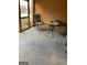 View of a screened-in porch featuring outdoor furniture at 3223 Thornecreek Dr, Douglasville, GA 30135