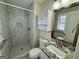 Renovated bathroom with tiled shower and granite vanity at 2270 Titan Ridge Dr, Decatur, GA 30035