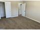 Carpeted bedroom with two closets at 2270 Titan Ridge Dr, Decatur, GA 30035