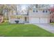 Charming home with a well-manicured lawn and a two-car garage at 2270 Titan Ridge Dr, Decatur, GA 30035