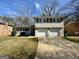 Charming home with a well-manicured lawn and a two-car garage at 2270 Titan Ridge Dr, Decatur, GA 30035