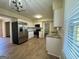 Modern kitchen with stainless steel appliances, white cabinets, and hardwood floors at 2270 Titan Ridge Dr, Decatur, GA 30035