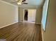 Spacious living room featuring hardwood floors, crown molding and natural light at 2270 Titan Ridge Dr, Decatur, GA 30035