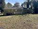 Expansive backyard features a brick home with a patio perfect for outdoor enjoyment at 2804 Mitchell Dr, Decatur, GA 30032