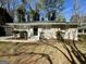 Single-story home with a tidy front yard and neutral-colored exterior at 2804 Mitchell Dr, Decatur, GA 30032