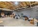 Unfinished basement featuring exposed ceiling beams, concrete walls and floors, offering potential for customization at 391 Hickory Lake Dr, Acworth, GA 30101