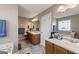 Bathroom with double vanity, soaking tub and neutral colors at 391 Hickory Lake Dr, Acworth, GA 30101