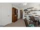 Neutral toned bedroom featuring a desk and bookcase and chair at 391 Hickory Lake Dr, Acworth, GA 30101