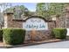 Stone sign welcomes residents to Hickory Lake community at 391 Hickory Lake Dr, Acworth, GA 30101