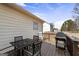 Outdoor deck with dining set and grill at 391 Hickory Lake Dr, Acworth, GA 30101