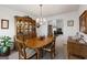 Traditional dining room with hutch, pendant lighting and hardwood dining table at 391 Hickory Lake Dr, Acworth, GA 30101