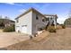 Back of home featuring deck, screened-in porch, garage, and partially grass yard at 391 Hickory Lake Dr, Acworth, GA 30101