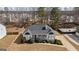 Overhead shot of home featuring manicured bushes, a covered front porch and a driveway at 391 Hickory Lake Dr, Acworth, GA 30101