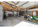 Spacious garage with concrete floors and exposed ceiling, perfect for storage and hobbies at 391 Hickory Lake Dr, Acworth, GA 30101