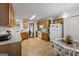 Well-lit kitchen featuring an eat-in area and wooden cabinetry at 391 Hickory Lake Dr, Acworth, GA 30101
