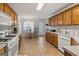 Eat-in kitchen with lots of counter space and wooden cabinetry at 391 Hickory Lake Dr, Acworth, GA 30101