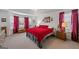 Bright main bedroom featuring neutral walls, curtains, and ample natural light from bay window at 391 Hickory Lake Dr, Acworth, GA 30101