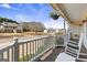 Inviting covered porch with rocking chairs, perfect for relaxing and enjoying the neighborhood view at 391 Hickory Lake Dr, Acworth, GA 30101