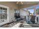 Cozy screened porch with lots of light, comfortable seating, and outdoor views at 391 Hickory Lake Dr, Acworth, GA 30101