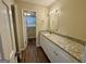 Bathroom featuring granite counters, and white cabinets at 2430 Fern Valley Ct, East Point, GA 30344